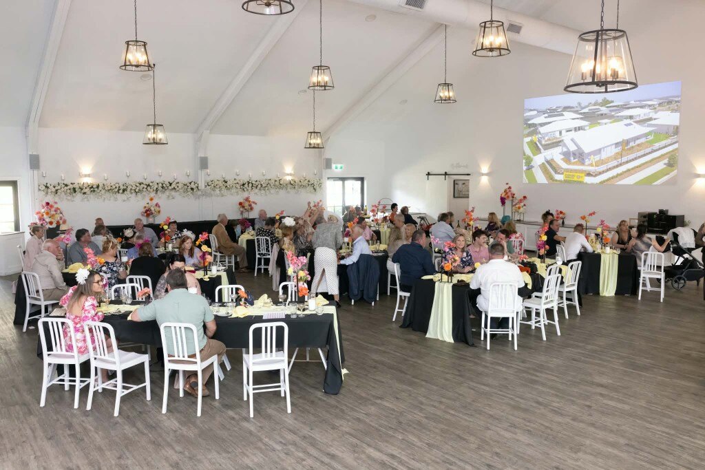 Guests dining in the White Barn during a Melbourne Cup luncheon