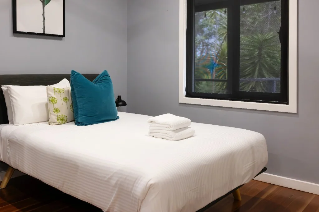 Guest house bedroom with garden views