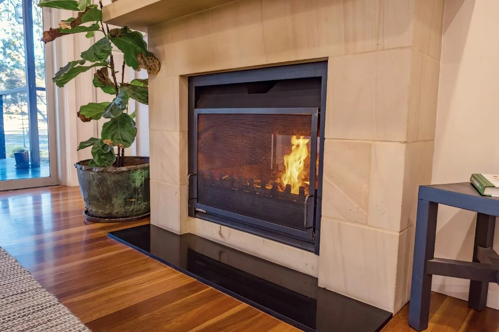 Stone fireplace in the guest house living area