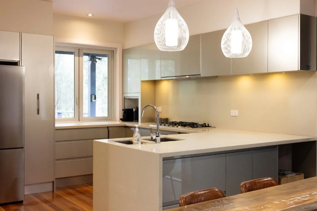 Guest house kitchen with stone island
