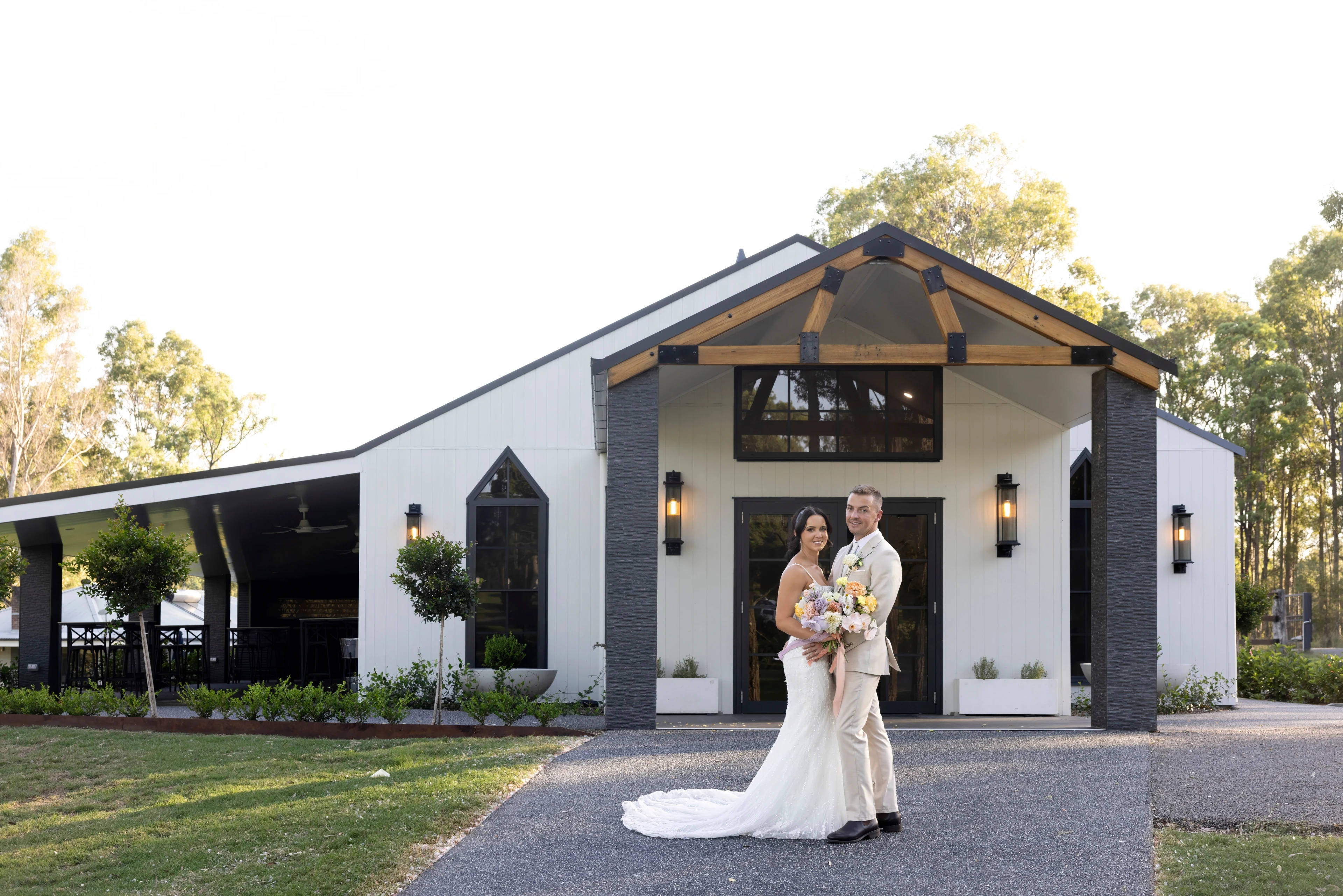 Bride and groom at White Barn Pokolbin exterior
