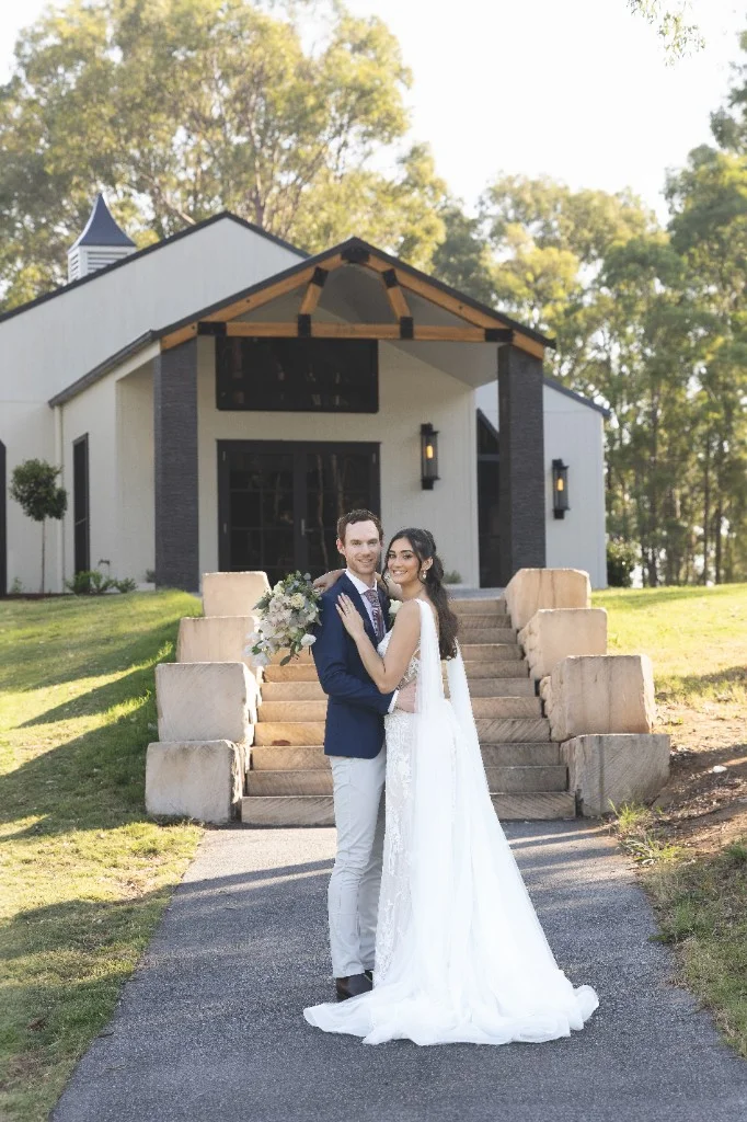 Bride and groom outside White Chapel at White Barn Pokolbin Hunter Valley wedding venue
