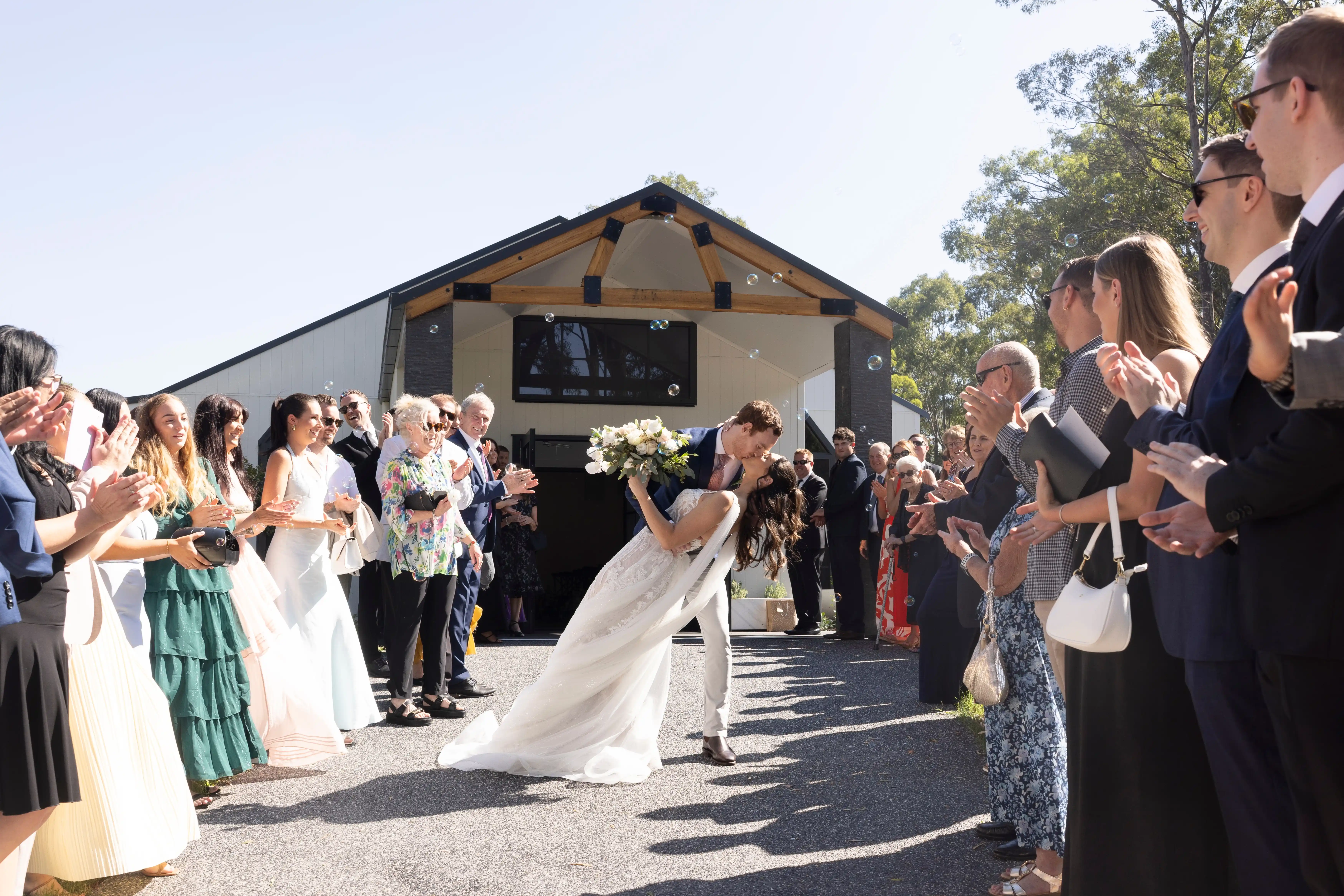 Bride walking down the aisle at White Chapel Pokolbin